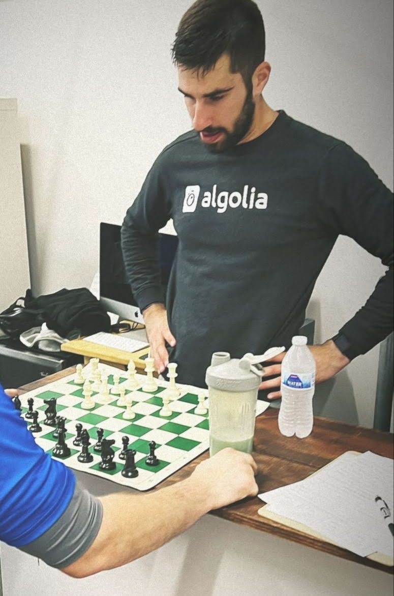 Khalid playing chess with Ben after training